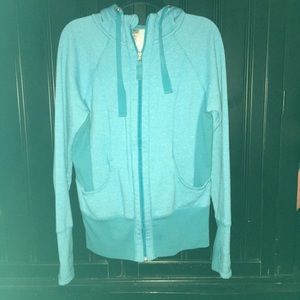Woman’s turquoise zipper front hoodie. Large
